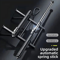 Upgraded automatic spring stick with textured grip on a dark background