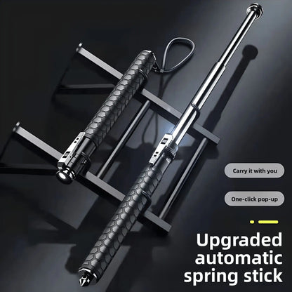 Upgraded automatic spring stick with textured grip on a dark background